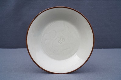 A Chinese dingyao carved 'ducks' plate, probably Song
